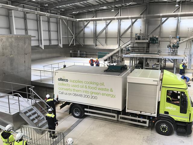 Food waste reception and processing hall with collection vehicle